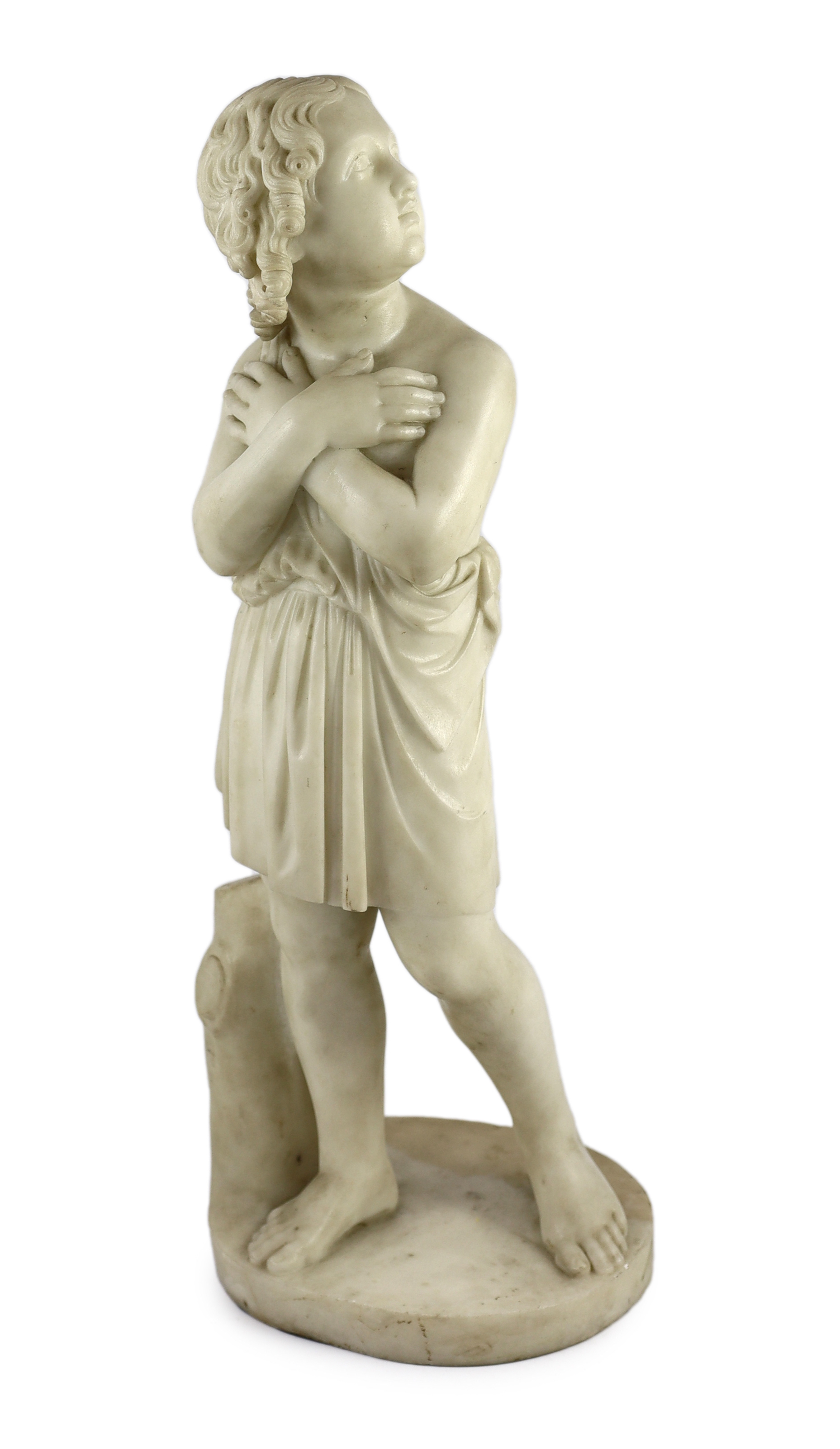 Manner of Luigi Bienaimé (Italian, 1795-1878). An Italian carved white marble figure of a youth wearing a toga, 59cm high